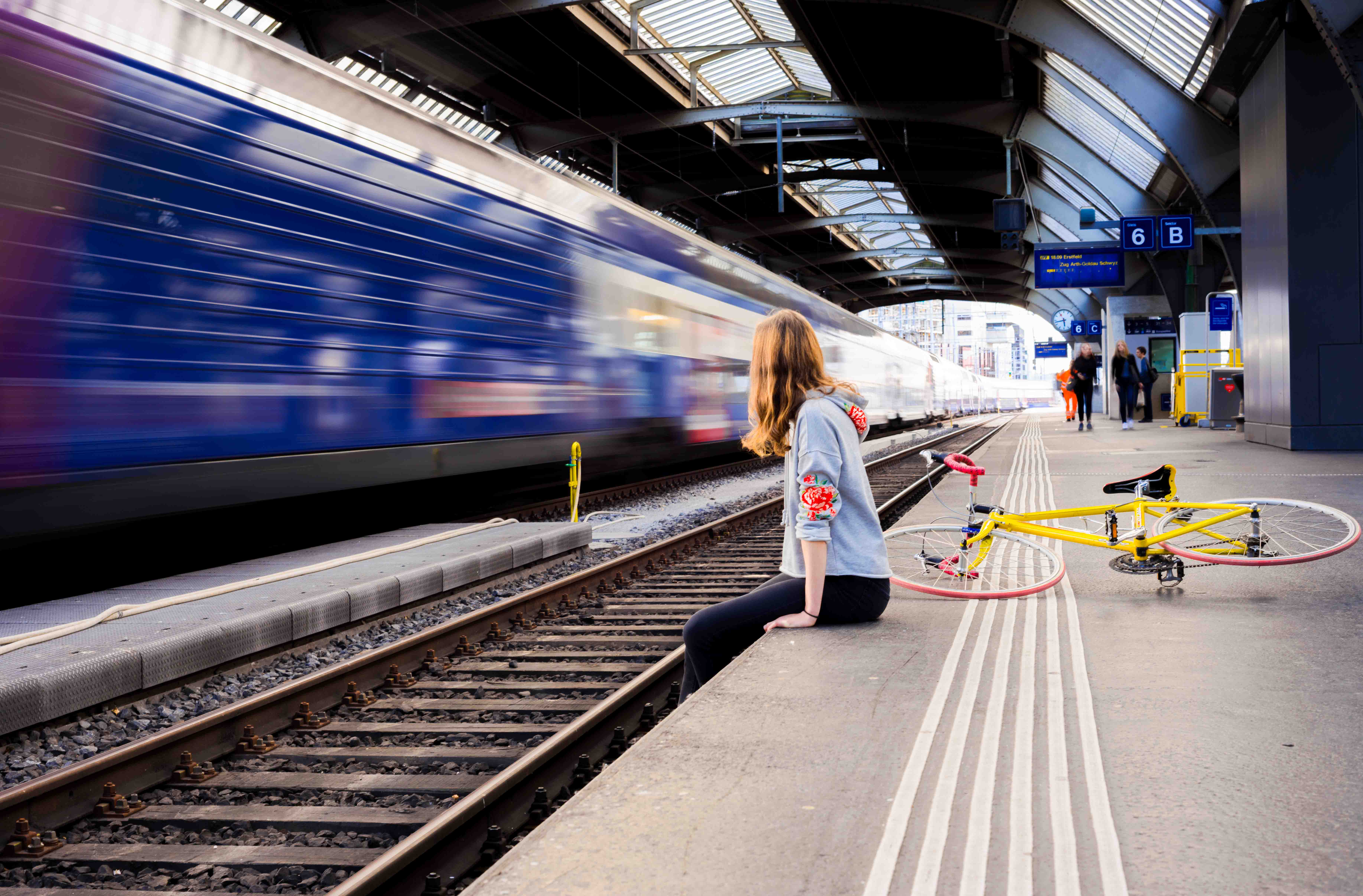 Girl at train station III