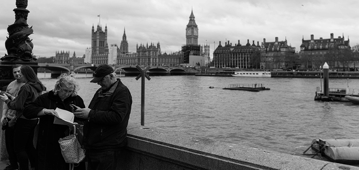 Tourists next to London Eye
